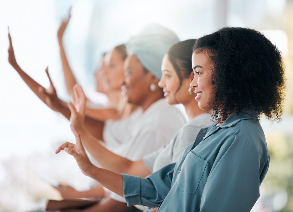 Seminar, question and hands raised with business people in conference meeting for faq, training or